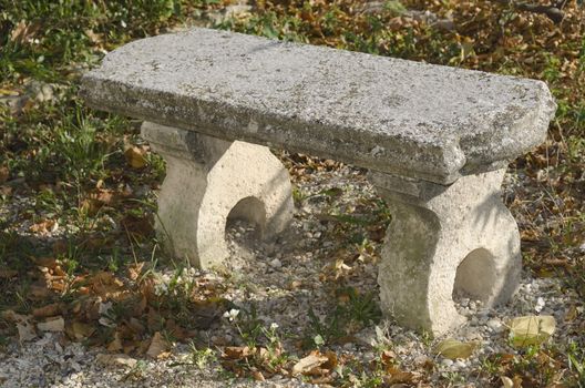 old stone bench in a park