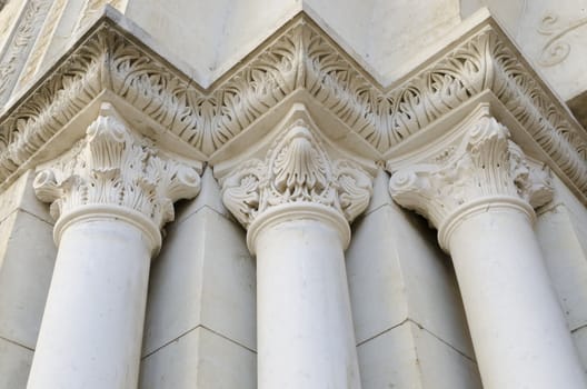 three columns on an ancient building