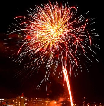 Fireworks Against the Night Sky of a Cityscape