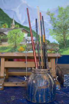 Photo of paintbrushes inside a cup