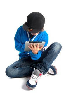 a teenage boy with a tablet