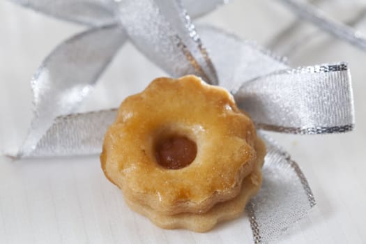 Cookie with silver bow .