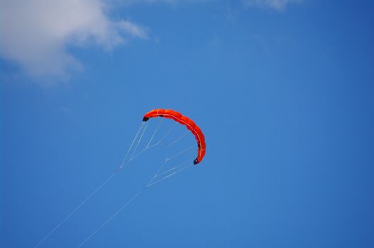 Colorful kite flying in the summer breeze