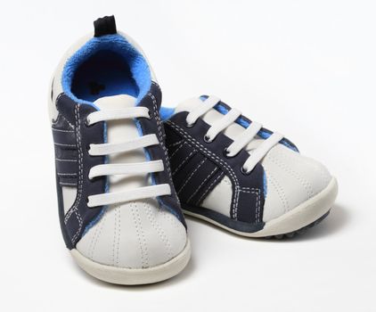A pair of generic blue baby boy shoes