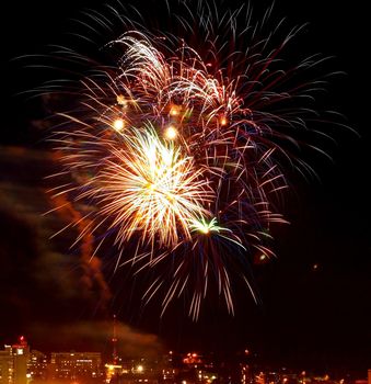 Fireworks Against the Night Sky of a Cityscape