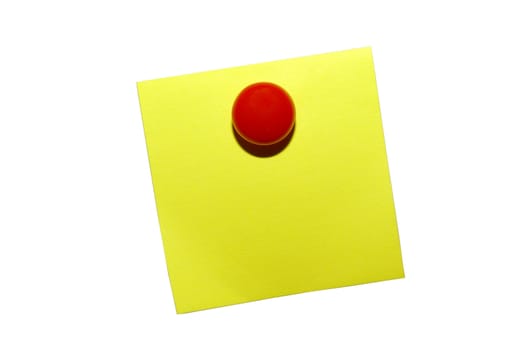 Yellow sticky notepaper with red magnet. Isolated on ehite with clipping path.