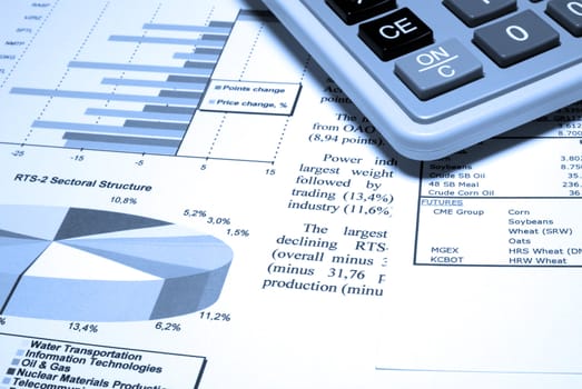 Calculator and finance diagrams.