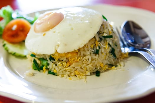Fried Rice with Crab on white dish.