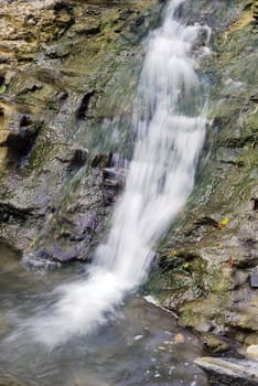 Small waterfall. Mountain river near Black Sea.