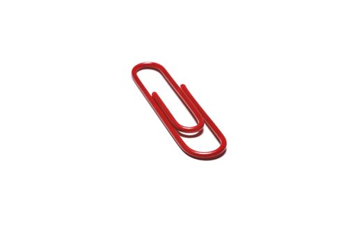 Red paper-clip isolated on white background.