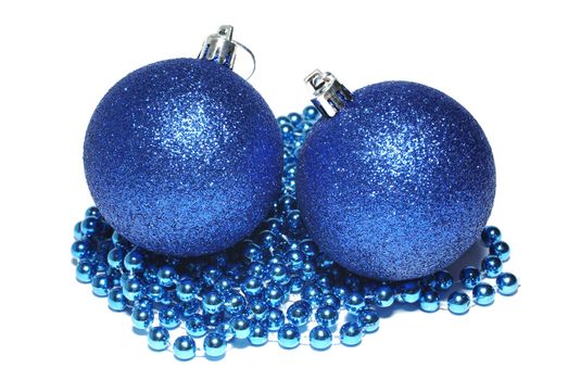 Blue christmas balls and blue ornament isolated on white background.