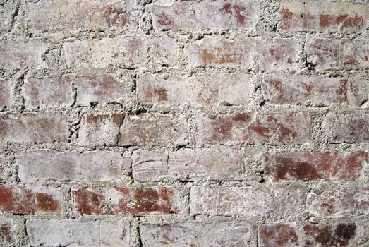 Very old red brick wall in Cairo. Textured background.