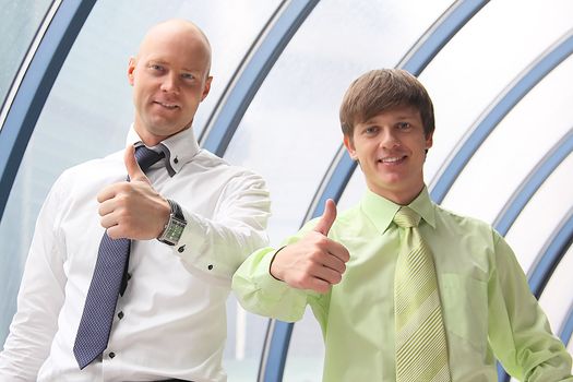 Portrait of two young and successful businessmen