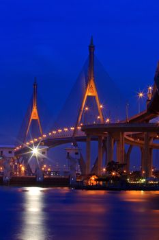 The Industrial Ring Bridge or Mega Bridge at dusk in Thailand Vertical. The Bridge cross over Bangkok Harbor