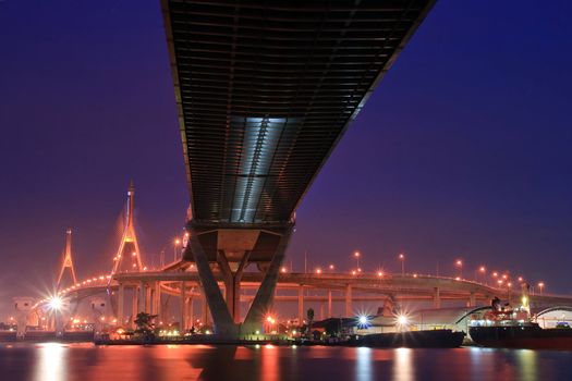 Landscape of Industrial Ring Bridge or Mega Bridge at dusk in Thailand Vertical. The Bridge cross over Bangkok Harbor