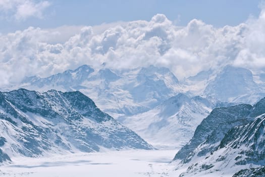 Cloudy Pattern at Aletsch alps glacier Switzerland JungFrau