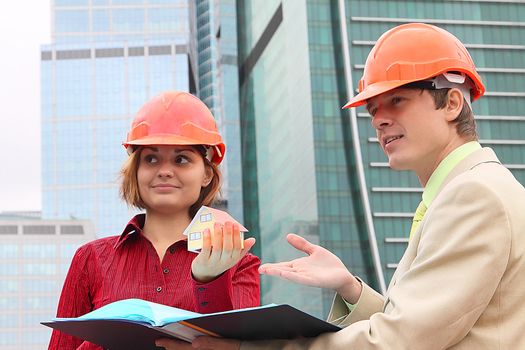 Business man and the woman discuss the project