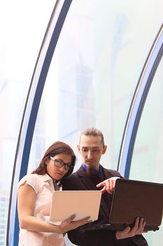 Business man and the woman discuss the project