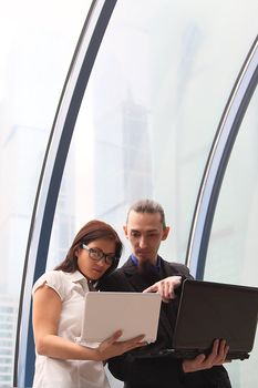 Business man and the woman discuss the project