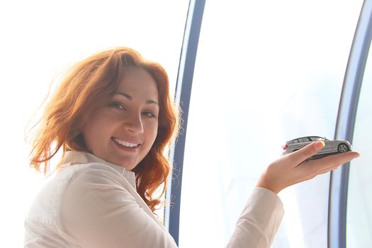 Portrait of the beautiful and young business woman