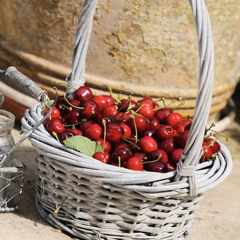 Some beautiful sweet cherry fruit in basket 