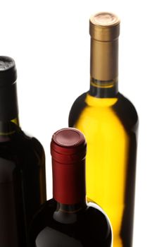 bottles of red and white wine on white background