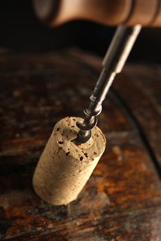 corkscrew and wooden barrel, close up