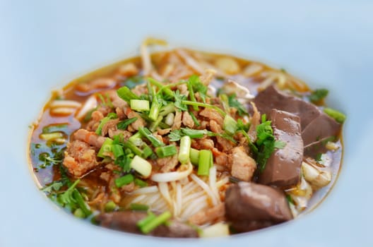  rice noodles with spicy pork sauce , Thai cuisine