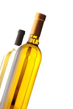 bottles of white wine on white background