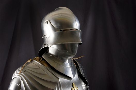 Armour of the medieval knight. Metal protection of the soldier against the weapon of the opponent