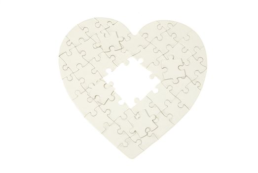 heart made from the puzzle on white