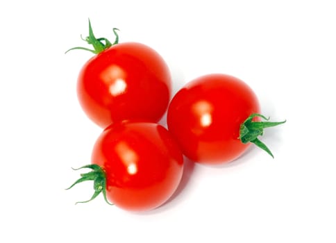 Fresh tomatoes isolated on white