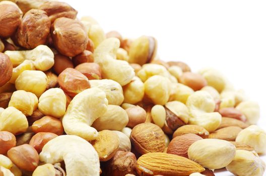 Assorted mixed nuts on white background