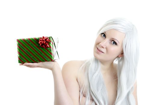 attractive blond girl holding gift in hand isolated on white bachground
