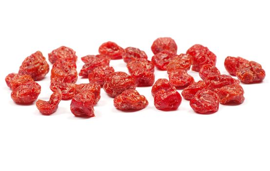 red dried goji berries on white
