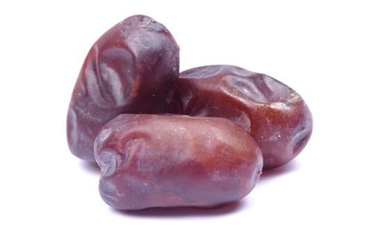 dryed dates on white background
