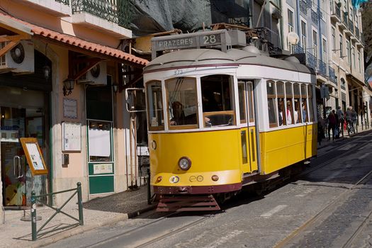 Typical yellow tram , Lisbon, Portugal