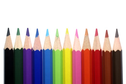 Many color pencils isolated on white background.