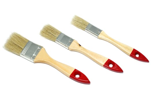 Three different brushes isolated on white background.