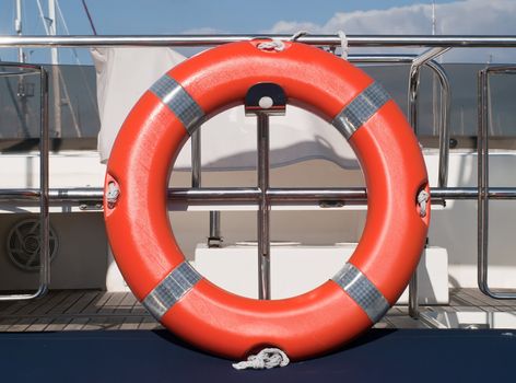 orange rescue ring on the boat