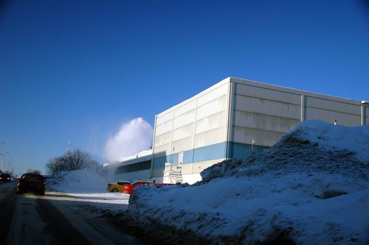 Snowblowing on roof. Larvik, Vestfold, Norway.
Winter 2005/2006.