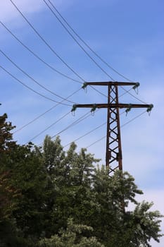 A distribution line over blue sky