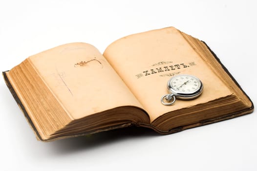 vintage watch over old book