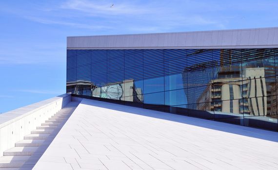 Detail from the Opera house in Oslo, with reflections from the city of Oslo