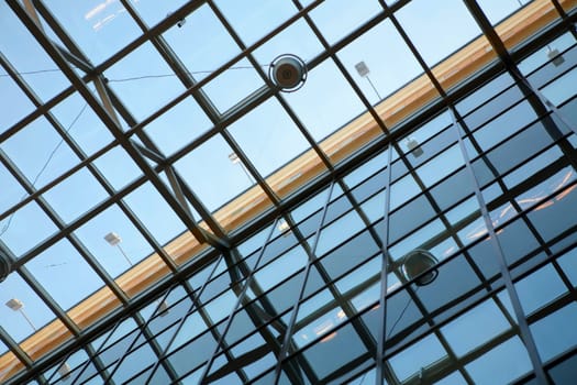 abstraction, transparent ceiling of the modern office building with orange stripe