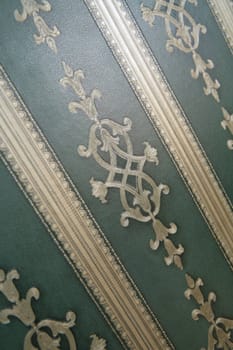 abstraction, texture, background, old-time green wallpaper on wall of the destroyed building