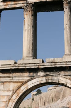 Hadrian's Arch in Athens, with the parthenon seen in the background.