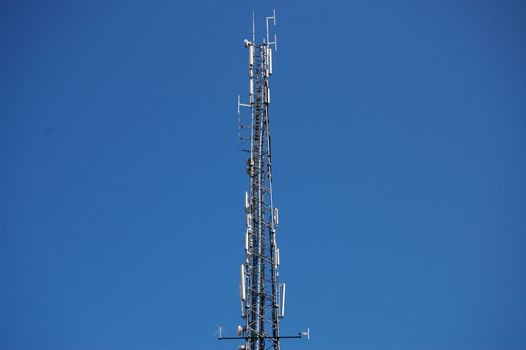 The top of mast with telecom-equipment.