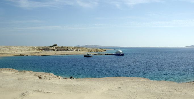 Ships in bay. Red sea, Egyptian desert.