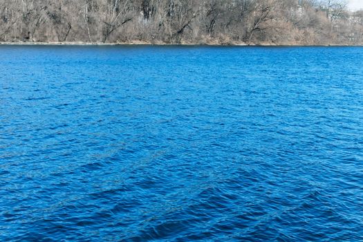 Waves on the reservoir in autumn fine day